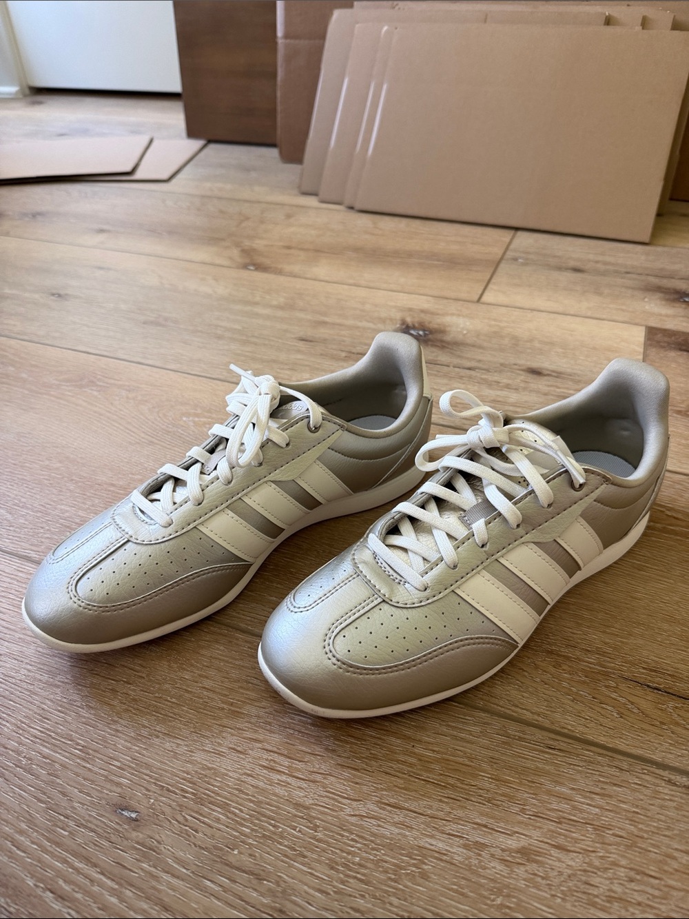 adidas women’s Metallic Beige and White Sneakers